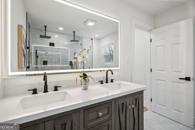 7410 Fields Dr, Cumming, GA 30041 - bathroom featuring a shower stall, recessed lighting, double vanity, and a sink