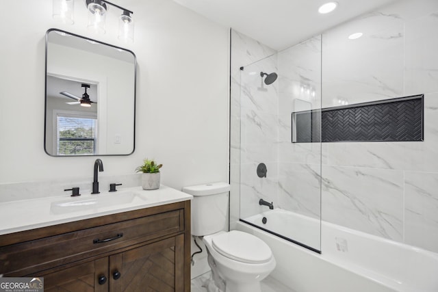 7410 Fields Dr, Cumming, GA 30041 - full bath with a ceiling fan, toilet,  shower combination, and vanity