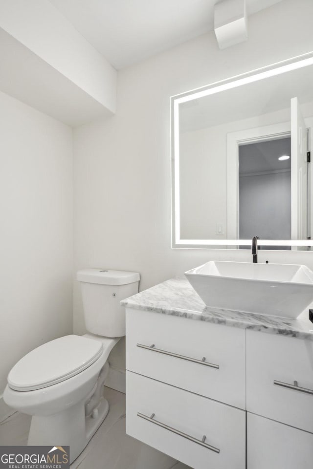 7410 Fields Dr, Cumming, GA 30041 - bathroom featuring vanity and toilet
