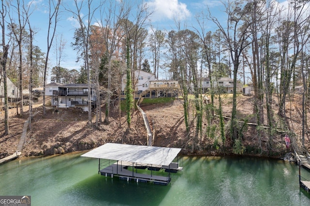 7410 Fields Dr, Cumming, GA 30041 - view of dock with stairway and a water view