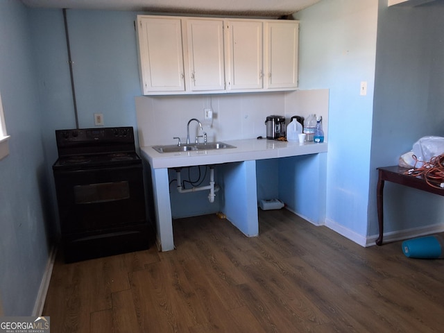 kitchen featuring white cabinets, a sink, black electric range oven, and dark wood finished floors