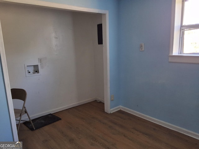 laundry room featuring laundry area, hookup for a washing machine, baseboards, and wood finished floors