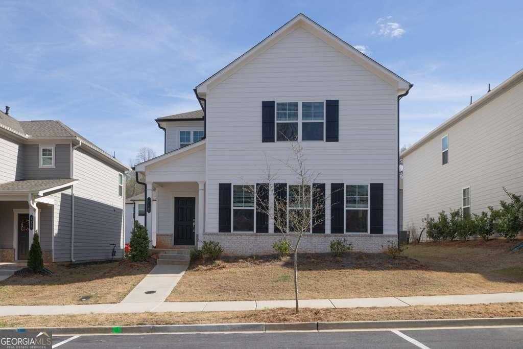 112 Osprey Overlook Dr, Braselton, GA 30517 - traditional home with brick siding