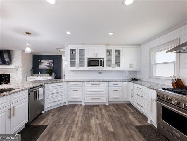 6041 Blackberry Ln, Buford, GA 30518 - kitchen featuring appliances with stainless steel finishes, decorative backsplash, white cabinetry, glass insert cabinets, and recessed lighting
