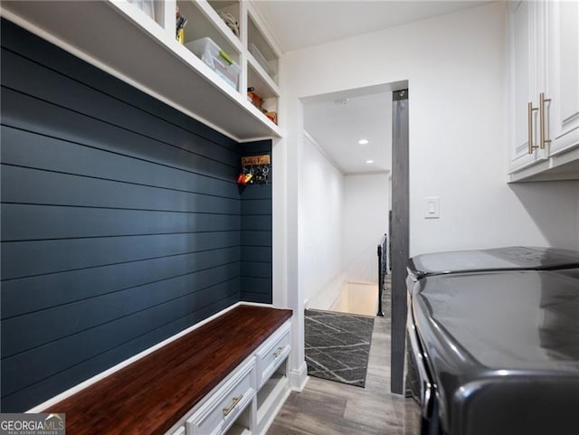 6041 Blackberry Ln, Buford, GA 30518 - mudroom featuring washer and clothes dryer and wood finished floors