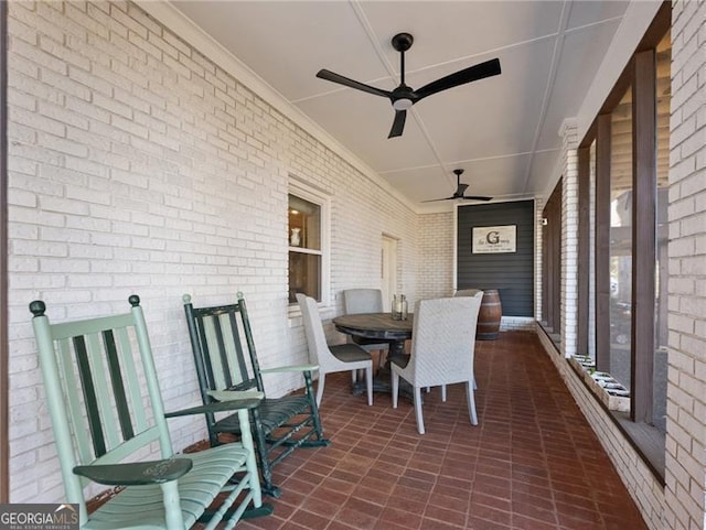 6041 Blackberry Ln, Buford, GA 30518 - sunroom / solarium featuring a ceiling fan and outdoor dining space