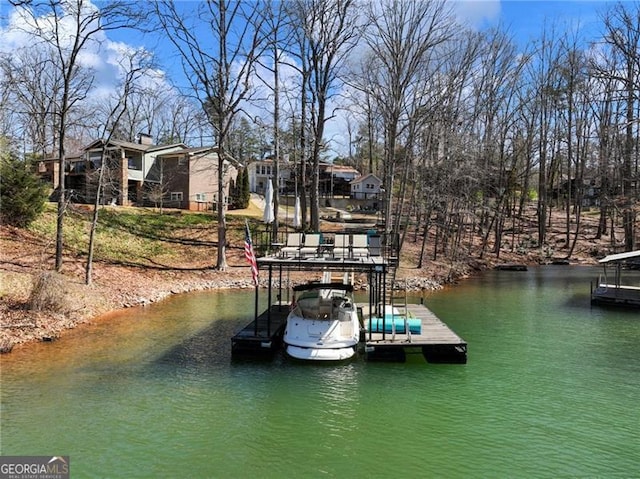 6041 Blackberry Ln, Buford, GA 30518 - dock featuring a water view and boat lift
