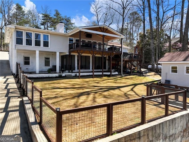6041 Blackberry Ln, Buford, GA 30518 - back of property with a chimney, a deck, and stairs