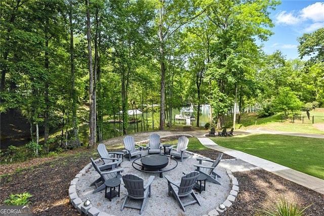 6041 Blackberry Ln, Buford, GA 30518 - view of patio featuring a fire pit