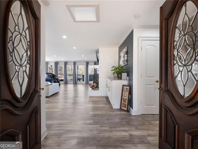 6041 Blackberry Ln, Buford, GA 30518 - entrance foyer with crown molding, dark wood finished floors, and recessed lighting