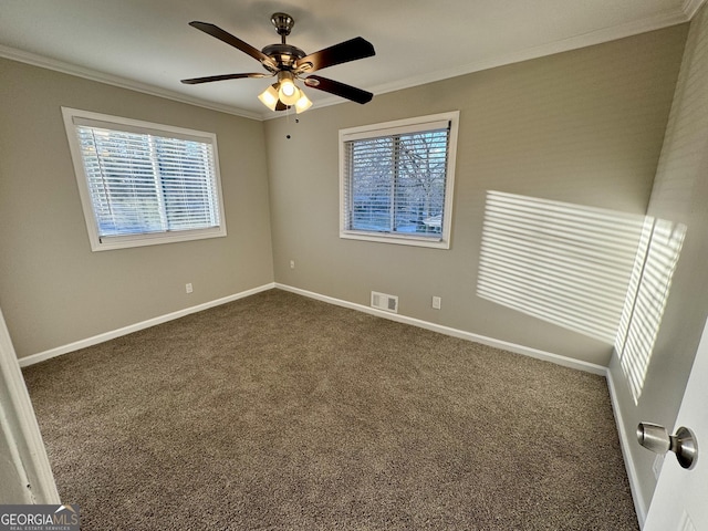 1380 Margarette Dr, Decatur, GA 30035 - spare room with crown molding, baseboards, visible vents, and dark colored carpet