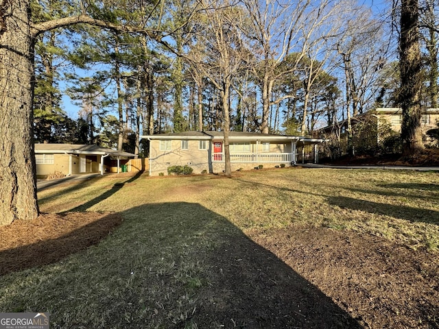 1380 Margarette Dr, Decatur, GA 30035 - back of house with a lawn and a carport