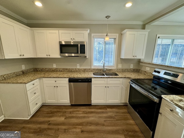 1380 Margarette Dr, Decatur, GA 30035 - kitchen featuring dark wood-style floors, white cabinets, appliances with stainless steel finishes, and a sink