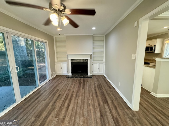 1380 Margarette Dr, Decatur, GA 30035 - unfurnished living room featuring a ceiling fan, dark wood-style floors, baseboards, a high end fireplace, and crown molding