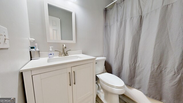 5612 Hickory Dr, Patterson, GA 31557 - full bathroom with toilet, vanity, and shower / bath combo