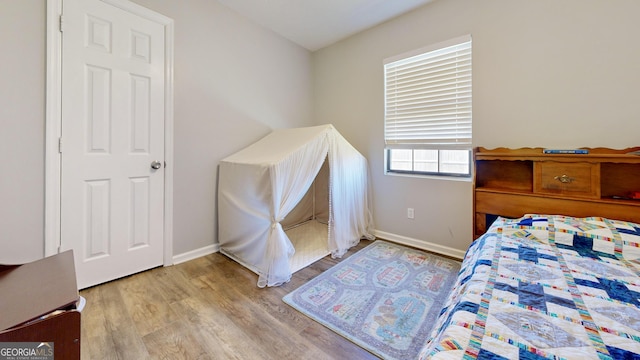 5612 Hickory Dr, Patterson, GA 31557 - bedroom with light wood-type flooring and baseboards
