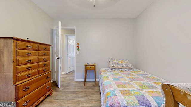 5612 Hickory Dr, Patterson, GA 31557 - bedroom with a ceiling fan, light wood-type flooring, and baseboards