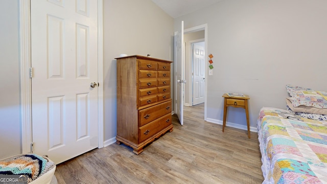 5612 Hickory Dr, Patterson, GA 31557 - bedroom featuring baseboards and light wood finished floors