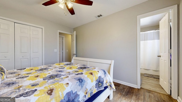 5612 Hickory Dr, Patterson, GA 31557 - bedroom featuring a ceiling fan, visible vents, wood finished floors, baseboards, and a closet