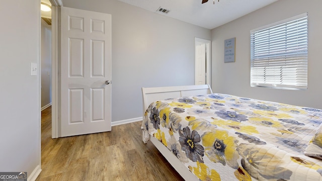 5612 Hickory Dr, Patterson, GA 31557 - bedroom featuring a ceiling fan, wood finished floors, visible vents, and baseboards