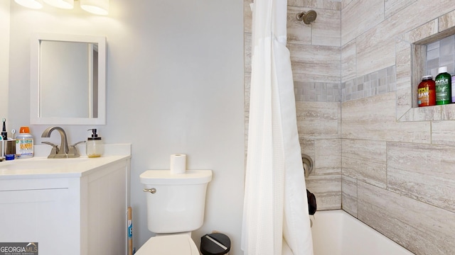 5612 Hickory Dr, Patterson, GA 31557 - bathroom featuring vanity, shower / bath combination with curtain, and toilet