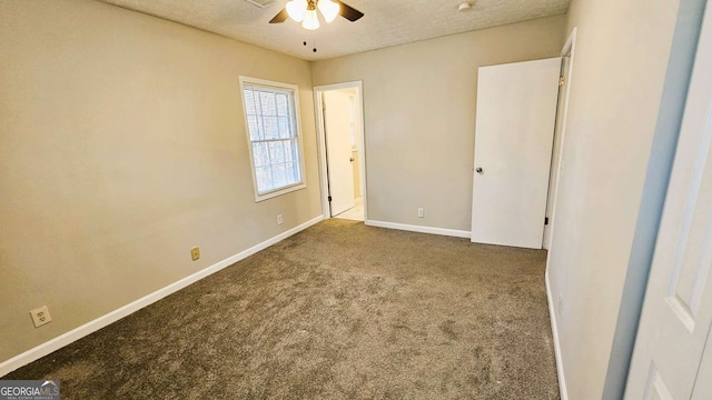 2172 Nancy Way, Loganville, GA 30052 - unfurnished bedroom featuring carpet, baseboards, and a textured ceiling