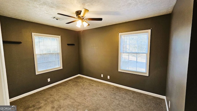 2172 Nancy Way, Loganville, GA 30052 - carpeted empty room with a wealth of natural light, baseboards, and a ceiling fan