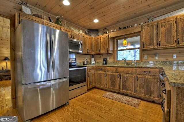 65 Weoka Ct, Ellijay, GA 30540 - kitchen featuring appliances with stainless steel finishes, light wood finished floors, wood ceiling, brown cabinetry, and recessed lighting