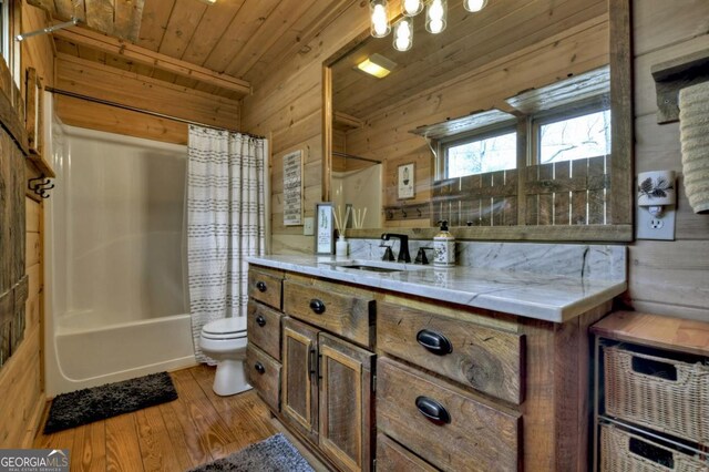 65 Weoka Ct, Ellijay, GA 30540 - bathroom with wooden ceiling, toilet, wood finished floors, wood walls, and vanity