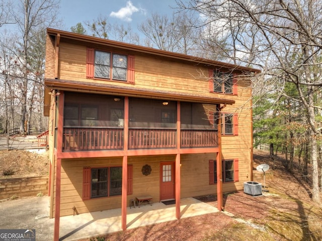 65 Weoka Ct, Ellijay, GA 30540 - rear view of house with a sunroom, a patio area, and central AC unit