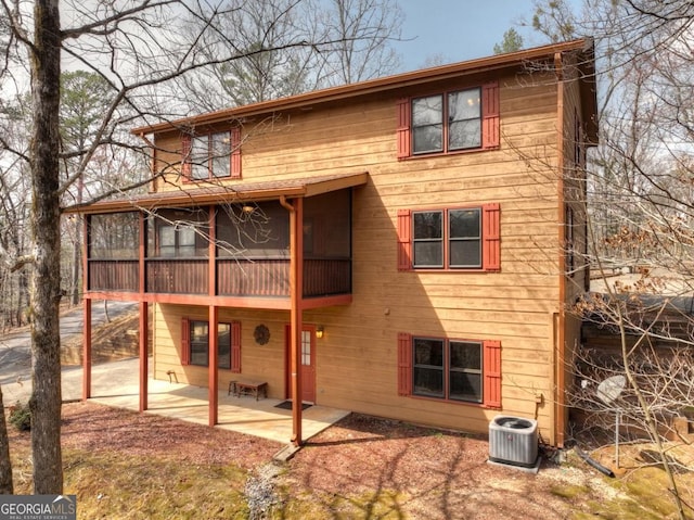 65 Weoka Ct, Ellijay, GA 30540 - back of house featuring a patio, a sunroom, and cooling unit