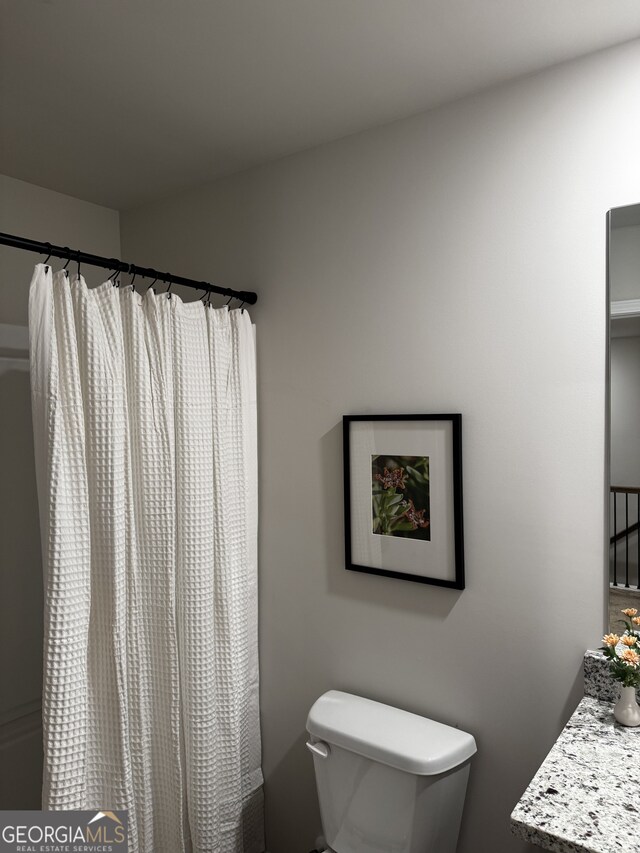 235 Ivey Ter Unit 40, Temple, GA 30179 - full bath featuring toilet, vanity, and a shower with curtain