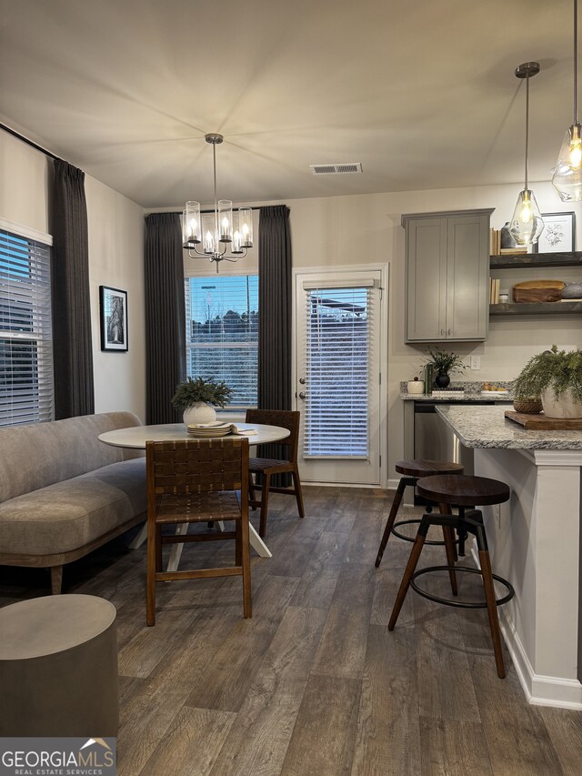 235 Ivey Ter Unit 40, Temple, GA 30179 - dining area with dark wood finished floors, visible vents, and a chandelier