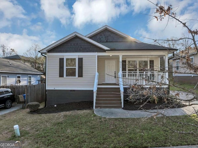 2478 Verbena Cir NW, Atlanta, GA 30314 - bungalow-style home featuring a porch, fence, a front yard, and crawl space