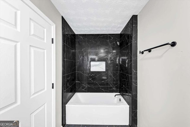 2478 Verbena Cir NW, Atlanta, GA 30314 - full bathroom featuring a textured ceiling and shower / bathtub combination