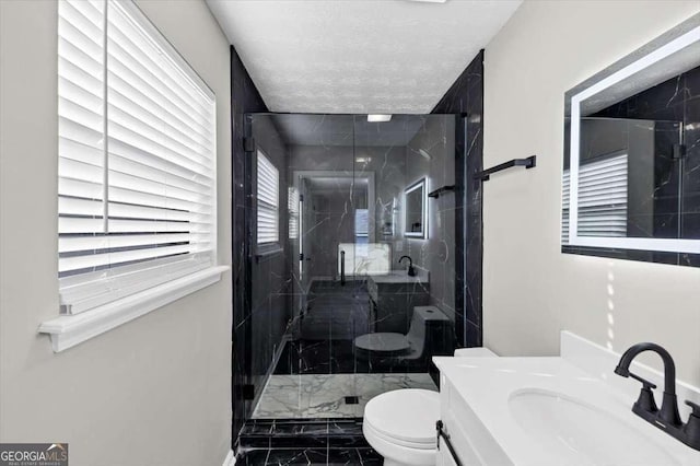 2478 Verbena Cir NW, Atlanta, GA 30314 - bathroom featuring vanity, a marble finish shower, a textured ceiling, toilet, and marble finish floor