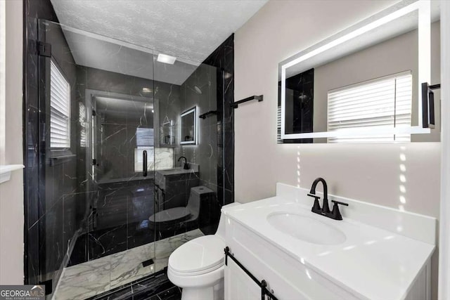 2478 Verbena Cir NW, Atlanta, GA 30314 - bathroom with a marble finish shower, toilet, vanity, and a textured ceiling