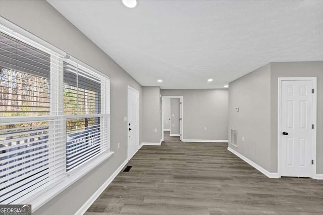 2478 Verbena Cir NW, Atlanta, GA 30314 - spare room featuring recessed lighting, visible vents, baseboards, and wood finished floors