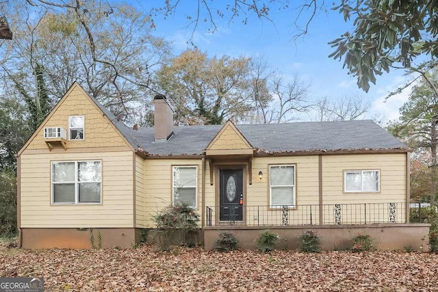 3426 Glenwood Rd, Decatur, GA 30032 - view of front of house with a chimney and a shingled roof