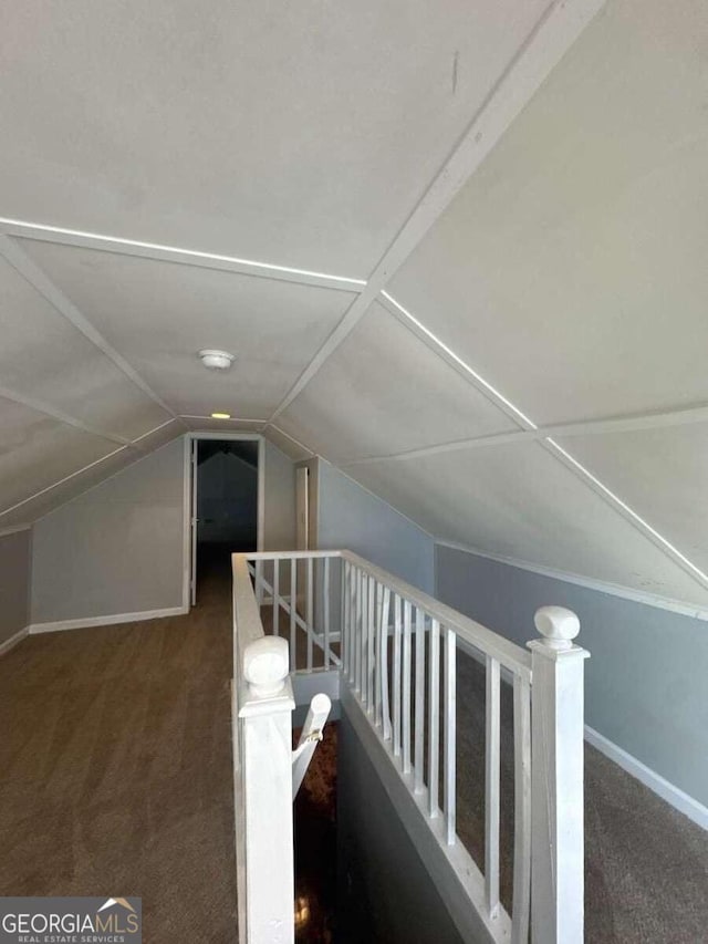 3426 Glenwood Rd, Decatur, GA 30032 - additional living space with carpet flooring, baseboards, and lofted ceiling