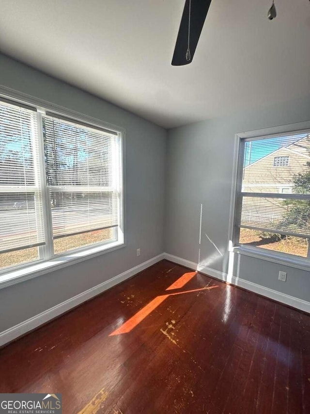 3426 Glenwood Rd, Decatur, GA 30032 - unfurnished room featuring baseboards and wood finished floors