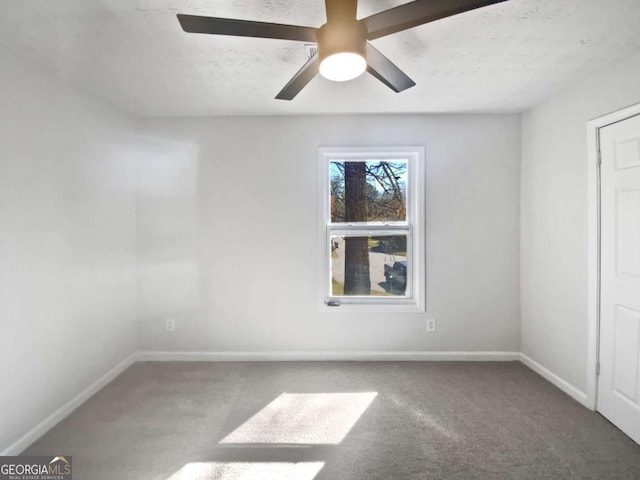 5216 Sweet Air Ln, Stone Mountain, GA 30088 - spare room featuring carpet flooring and ceiling fan