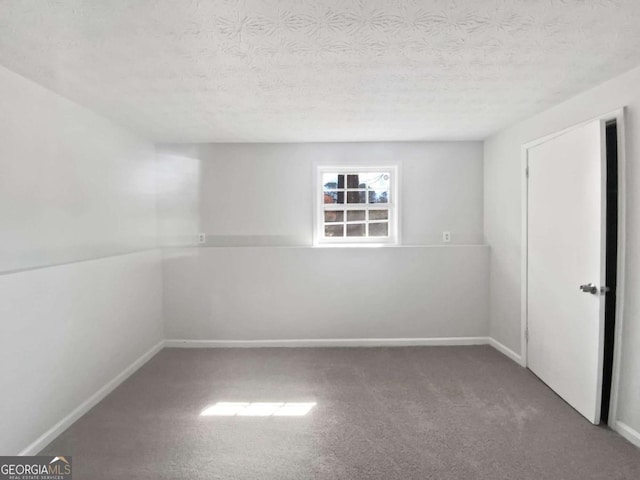 5216 Sweet Air Ln, Stone Mountain, GA 30088 - carpeted empty room featuring a textured ceiling