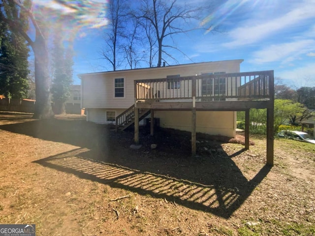 5216 Sweet Air Ln, Stone Mountain, GA 30088 - rear view of house featuring stairs and a deck