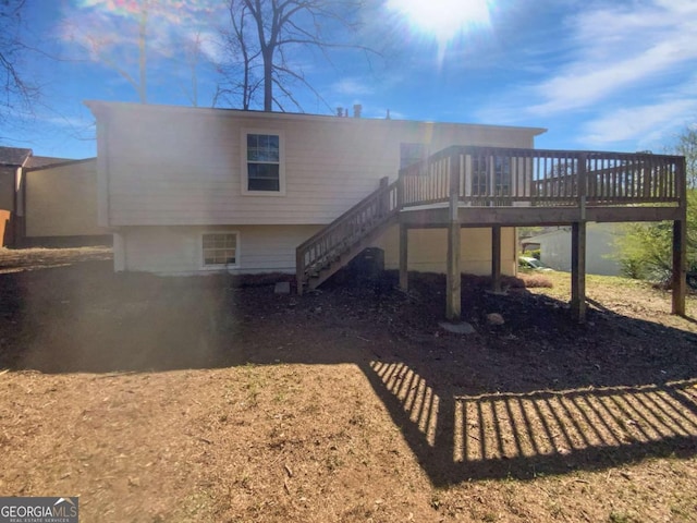 5216 Sweet Air Ln, Stone Mountain, GA 30088 - back of property with stairway and a deck