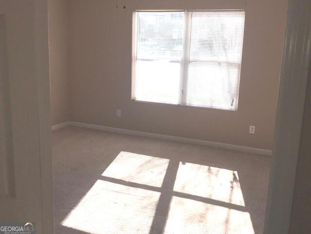 18102 Waldrop Cv, Decatur, GA 30034 - unfurnished room with baseboards