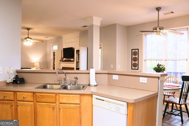 912 Tanners Point Dr, Lawrenceville, GA 30044 - living area with visible vents, baseboards, a brick fireplace, a ceiling fan, and carpet floors