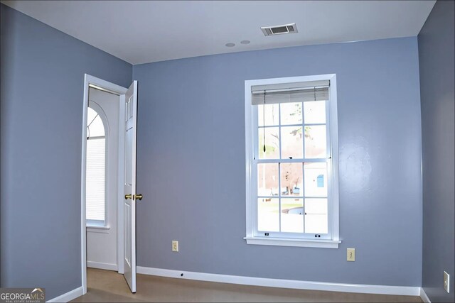 912 Tanners Point Dr, Lawrenceville, GA 30044 - bedroom with baseboards, light wood-style flooring, visible vents, and crown molding