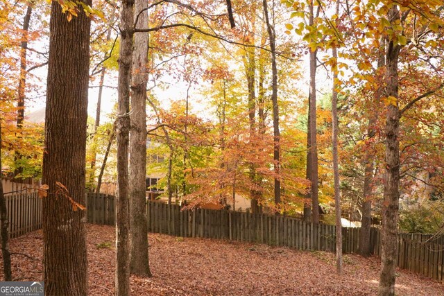 912 Tanners Point Dr, Lawrenceville, GA 30044 - rear view of house featuring stairway, a deck, and fence