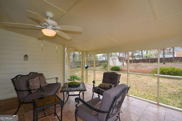 sunroom / solarium with ceiling fan